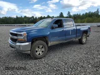 2018 Chevrolet Silverado 1500 LT with VIN 1GCUKRECXJF244367, listed as a Copart auction lot 72397034 with 123,275 mi miles and Salvage title. Bid and sale history available at DreamBid. Image 1.