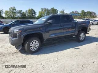 2024 Toyota Tacoma SR5 with VIN 3TYLB5JN6RT050463, listed as a Copart auction lot 80143225 with 6,619 mi miles and Salvage title. Bid and sale history available at DreamBid. Image 1.