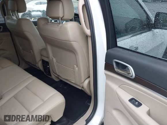 2018 Jeep Grand Cherokee Limited with VIN 1C4RJFBM8JC485043, listed as a IAAI auction lot 41611541 with 61,960 mi miles and . Bid and sale history available at DreamBid. Image 8.