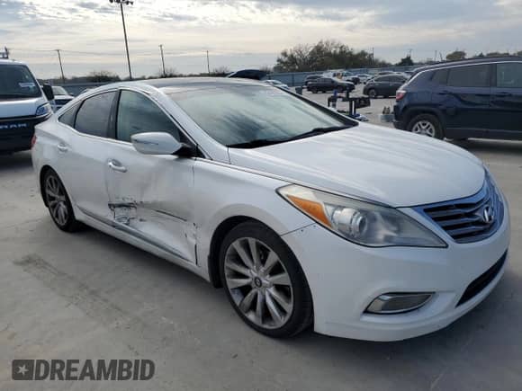 2013 Hyundai Azera with VIN KMHFH4JGXDA245793, listed as a Copart auction lot 82435324 with 144,269 mi miles and Clean title. Bid and sale history available at DreamBid. Image 4.