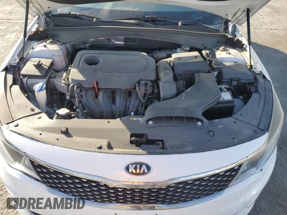 2018 Kia Optima LX z VIN 5XXGT4L34JG239893, wystawiony jako Copart lot #69809485 z przebiegiem 99 966 mil mil oraz Szkoda całkowita • Salvage title. Historia ofert i sprzedaży dostępna na DreamBid. Obrazek 11.