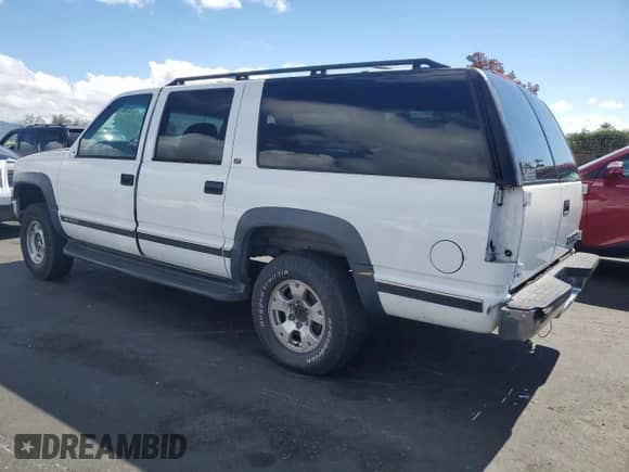 1999 Chevrolet Suburban с VIN 3GNFK16R8XG233203, выставлен на аукционе Copart как лот 84219905 с пробегом Не указан миль и Чистый • Clean title. История ставок и продаж доступна на DreamBid. Изображение 2.