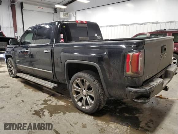 2016 GMC Sierra 1500 Denali z VIN 3GTU2PEJ7GG127971, wystawiony jako Copart lot #49950805 z przebiegiem 177 976 mil mil oraz Szkoda całkowita • Salvage title. Historia ofert i sprzedaży dostępna na DreamBid. Obrazek 2.