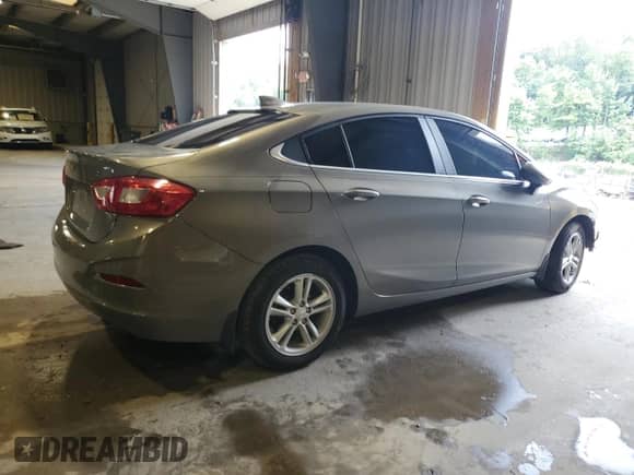 2017 Chevrolet Cruze LT с VIN 1G1BE5SM2H7171089, выставлен на аукционе Copart как лот 68960295 с пробегом 65 899 миль миль и Списание • Salvage title. История ставок и продаж доступна на DreamBid. Изображение 3.