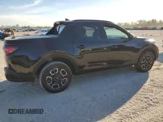 2022 Hyundai Santa Cruz SEL Premium с VIN 5NTJDDAF9NH033948, выставлен на аукционе Copart как лот 76879154 с пробегом 22 556 миль миль и Списание • Salvage title. История ставок и продаж доступна на DreamBid. Изображение 3.