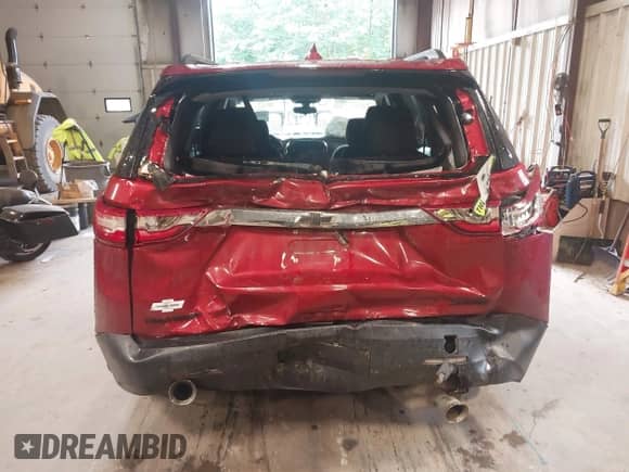 2019 Chevrolet Traverse LT Cloth z VIN 1GNERGKW8KJ307054, wystawiony jako IAAI lot #43052213 z przebiegiem 89 762 mil mil oraz . Historia ofert i sprzedaży dostępna na DreamBid. Obrazek 16.