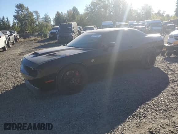 2016 Dodge Challenger SRT Hellcat with VIN 2C3CDZC90GH344499, listed as a Copart auction lot 83858625 with 52,074 mi miles and Salvage title. Bid and sale history available at DreamBid. Image 1.
