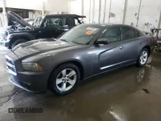 2013 Dodge Charger SXT z VIN 2C3CDXHG6DH544195, wystawiony jako Copart lot #66702265 z przebiegiem 193 895 mil mil oraz Szkoda całkowita • Salvage title. Historia ofert i sprzedaży dostępna na DreamBid. Obrazek 1.