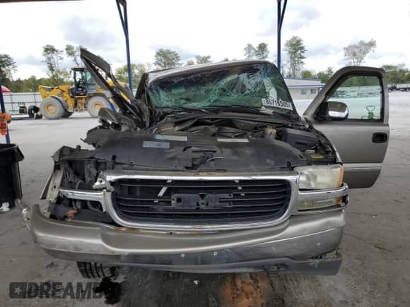2001 GMC Sierra 1500 SLE z VIN 1GTEK19T31E144505, wystawiony jako Copart lot #85718505 z przebiegiem Nie podano mil oraz Szkoda całkowita • Salvage title. Historia ofert i sprzedaży dostępna na DreamBid. Obrazek 5.