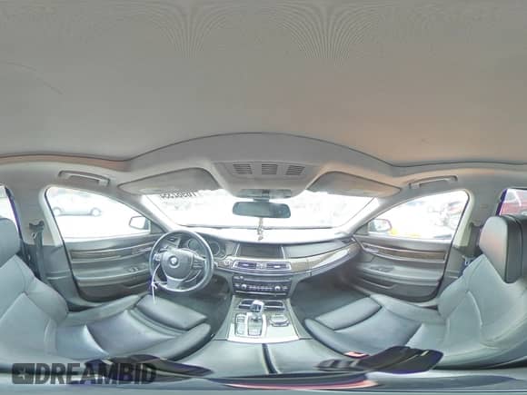 2015 BMW 7 Series 740i z VIN WBAYA6C58FD826958, wystawiony jako Copart lot #76982354 z przebiegiem 143 521 mil mil oraz Szkoda całkowita • Salvage title. Historia ofert i sprzedaży dostępna na DreamBid. Obrazek 12.