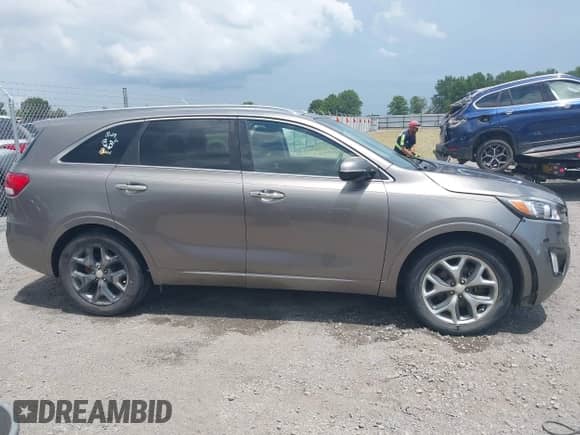 2016 Kia Sorento SXL with VIN 5XYPK4A58GG115170, listed as a IAAI auction lot 42689300 with 123,640 mi miles and . Bid and sale history available at DreamBid. Image 13.