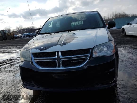 2011 Dodge Caravan with VIN 2D4JN1AGXBR618624, listed as a Copart auction lot 46597005 with 110,677 mi miles and Clean title. Bid and sale history available at DreamBid. Image 5.