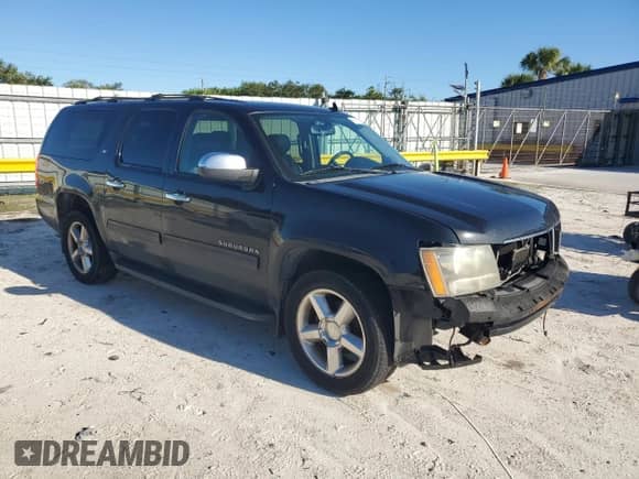2011 Chevrolet Suburban LT z VIN 1GNSCJE02BR145710, wystawiony jako Copart lot #86117175 z przebiegiem 182 942 mil mil oraz Szkoda całkowita • Salvage title. Historia ofert i sprzedaży dostępna na DreamBid. Obrazek 4.