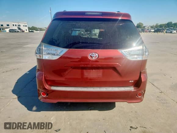 2015 Toyota Sienna SE with VIN 5TDXK3DC7FS676854, listed as a Copart auction lot 82444865 with 60,605 mi miles and Salvage title. Bid and sale history available at DreamBid. Image 6.