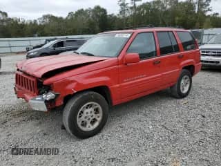 1998 Jeep Grand Cherokee Limited z VIN 1J4GZ78S0WC276411, wystawiony jako Copart lot #78200114 z przebiegiem 220 856 mil mil oraz Szkoda całkowita • Salvage title. Historia ofert i sprzedaży dostępna na DreamBid. Obrazek 1.