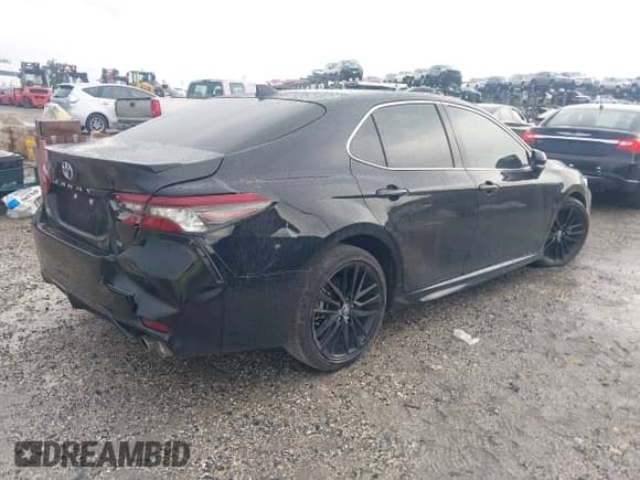 2024 Toyota Camry TRD with VIN 4T1KZ1AK4RU097239, listed as a IAAI auction lot 43181099 with 29,119 mi miles and . Bid and sale history available at DreamBid. Image 4.