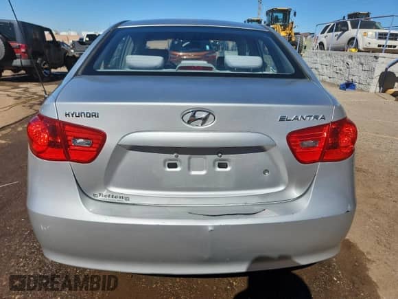 2007 Hyundai Elantra GLS with VIN KMHDU46D97U016705, listed as a Copart auction lot 84642125 with 106,584 mi miles and Salvage title. Bid and sale history available at DreamBid. Image 6.