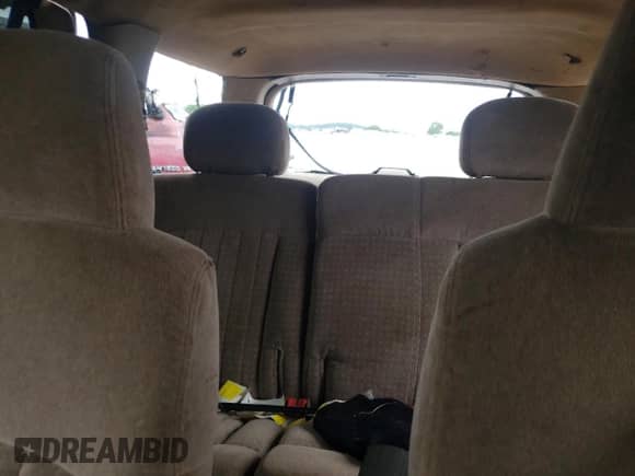 2000 Chevrolet Blazer LS z VIN 1GNCS13W6Y2155253, wystawiony jako Copart lot #55951095 z przebiegiem 243 661 mil mil oraz Szkoda całkowita • Salvage title. Historia ofert i sprzedaży dostępna na DreamBid. Obrazek 10.