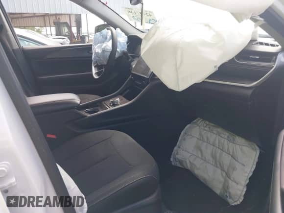 2023 Jeep Grand Cherokee Laredo with VIN 1C4RJHAG1PC641102, listed as a IAAI auction lot 42457130 with 50,533 mi miles and . Bid and sale history available at DreamBid. Image 5.