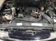 1998 Chevrolet Blazer LT z VIN 1GNDT13W3W2226889, wystawiony jako Copart lot #86559424 z przebiegiem 170 380 mil mil oraz Szkoda całkowita • Salvage title. Historia ofert i sprzedaży dostępna na DreamBid. Obrazek 11.