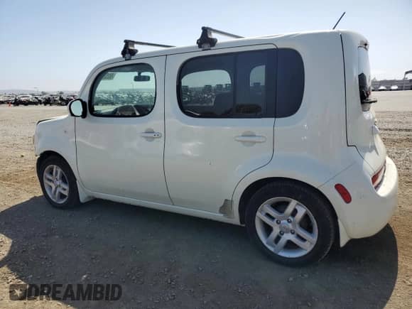 2011 Nissan Cube S Krom Edition с VIN JN8AZ2KR7BT200073, выставлен на аукционе Copart как лот 60252725 с пробегом 131 197 миль миль и Списание • Salvage title. История ставок и продаж доступна на DreamBid. Изображение 2.
