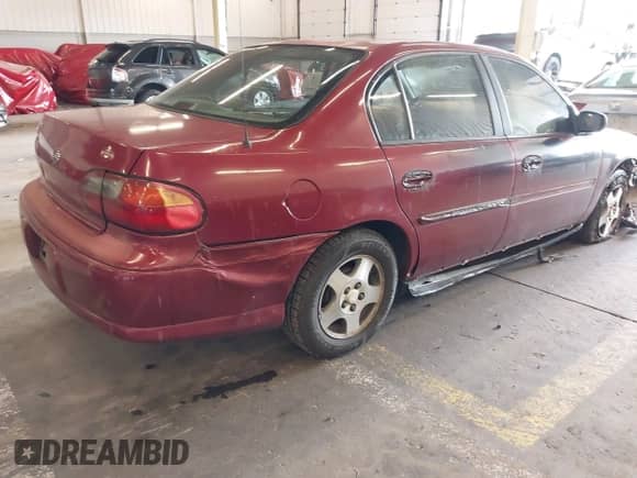 2004 Chevrolet Malibu Classic z VIN 1G1ND52F84M549946, wystawiony jako IAAI lot #42404927 z przebiegiem Nie podano mil oraz . Historia ofert i sprzedaży dostępna na DreamBid. Obrazek 16.