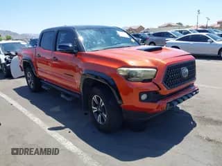 2018 Toyota Tacoma SR5 with VIN 5TFAZ5CN4JX058751, listed as a IAAI auction lot 42570303 with 120,683 mi miles and . Bid and sale history available at DreamBid. Image 1.