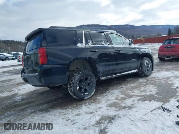 2019 Chevrolet Tahoe LS with VIN 1GNSKAKC9KR336283, listed as a IAAI auction lot 41280975 with 85,682 mi miles and . Bid and sale history available at DreamBid. Image 4.