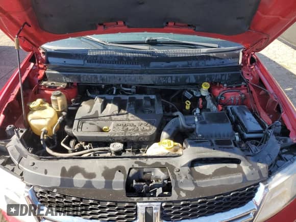 2013 Dodge Journey American Value z VIN 3C4PDCAB0DT722632, wystawiony jako Copart lot #71118975 z przebiegiem 184 012 mil mil oraz Czysty tytuł • Clean title. Historia ofert i sprzedaży dostępna na DreamBid. Obrazek 12.