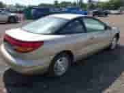 1999 Saturn SC with VIN 1G8ZH1277XZ127585, listed as a IAAI auction lot 43275573 with 96,289 mi miles and . Bid and sale history available at DreamBid. Image 4.