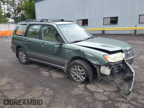 2007 Subaru Forester X L.L. Bean with VIN JF1SG67647H707556, listed as a Copart auction lot 66952605 with 156,710 mi miles and Salvage title. Bid and sale history available at DreamBid. Image 4.