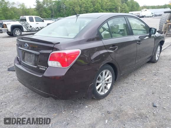 2012 Subaru Impreza Premium with VIN JF1GJAC66CH021643, listed as a IAAI auction lot 42287817 with 34,469 mi miles and . Bid and sale history available at DreamBid. Image 4.