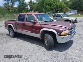 2001 Dodge Dakota Sport with VIN 1B7GG2AN91S168614, listed as a IAAI auction lot 42692637 with 145,204 mi miles and . Bid and sale history available at DreamBid. Image 1.