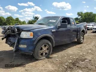 2005 Ford F-150 XLT with VIN 1FTPX14545FA61801, listed as a Copart auction lot 70943115 with Not provided miles and Salvage title. Bid and sale history available at DreamBid. Image 1.