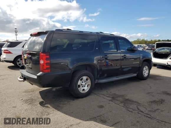 2014 Chevrolet Suburban LT с VIN 1GNSKJE77ER110021, выставлен на аукционе Copart как лот 82600855 с пробегом 220 769 миль миль и Чистый • Clean title. История ставок и продаж доступна на DreamBid. Изображение 3.