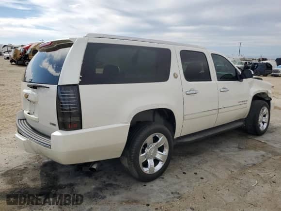 2010 Chevrolet Suburban LTZ with VIN 1GNUKKE38AR276439, listed as a Copart auction lot 52826305 with Not provided miles and Salvage title. Bid and sale history available at DreamBid. Image 3.