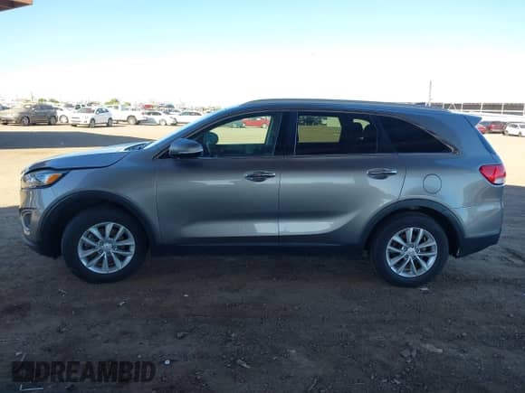 2018 Kia Sorento L with VIN 5XYPG4A35JG413425, listed as a IAAI auction lot 43383687 with 153,635 mi miles and . Bid and sale history available at DreamBid. Image 14.