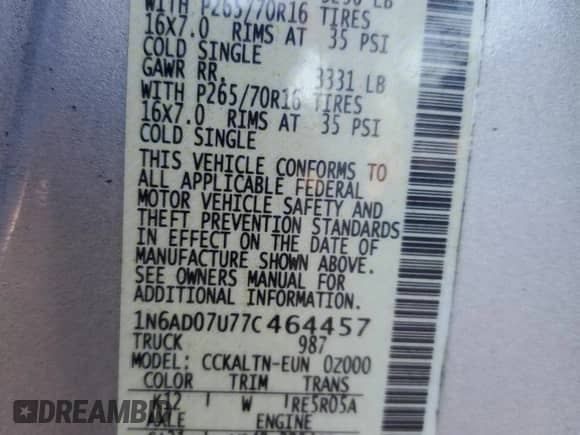 2007 Nissan Frontier SE z VIN 1N6AD07U77C464457, wystawiony jako Copart lot #82107355 z przebiegiem Nie podano mil oraz Szkoda całkowita • Salvage title. Historia ofert i sprzedaży dostępna na DreamBid. Obrazek 12.