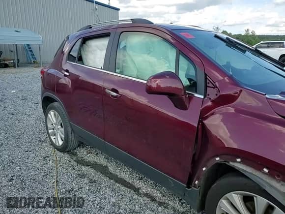 2017 Chevrolet Trax Premier with VIN 3GNCJMSB0HL187035, listed as a Copart auction lot 57125535 with Not provided miles and Salvage title. Bid and sale history available at DreamBid. Image 14.