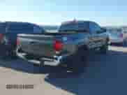 2023 Toyota Tacoma SR with VIN 3TYSZ5AN0PT105784, listed as a IAAI auction lot 43490092 with 108,330 mi miles and . Bid and sale history available at DreamBid. Image 4.