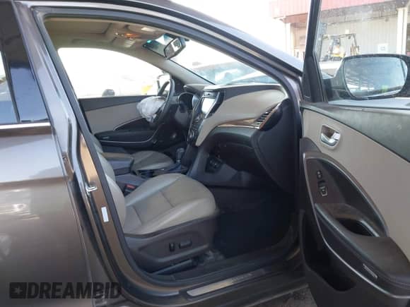2014 Hyundai Santa Fe with VIN 5XYZW3LAXEG140814, listed as a IAAI auction lot 43296039 with 115,419 mi miles and . Bid and sale history available at DreamBid. Image 5.