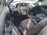 2013 Hyundai Veloster w/Black Int z VIN KMHTC6AD1DU130100, wystawiony jako Copart lot #83947425 z przebiegiem 155 402 mil mil oraz Szkoda całkowita • Salvage title. Historia ofert i sprzedaży dostępna na DreamBid. Obrazek 8.