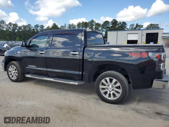 2012 Toyota Tundra Limited with VIN 5TFHW5F13CX228908, listed as a Copart auction lot 80839025 with 290,275 mi miles and Salvage title. Bid and sale history available at DreamBid. Image 2.