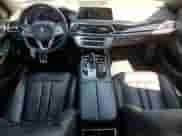 2019 BMW 7 Series 740i with VIN WBA7E2C58KB218095, listed as a Copart auction lot 64482195 with 87,118 mi miles and Salvage title. Bid and sale history available at DreamBid. Image 8.