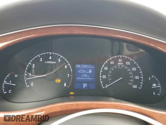 2012 Hyundai Genesis 3.8L z VIN KMHGC4DD1CU205264, wystawiony jako Copart lot #85598175 z przebiegiem 154 917 mil mil oraz Szkoda całkowita • Salvage title. Historia ofert i sprzedaży dostępna na DreamBid. Obrazek 9.