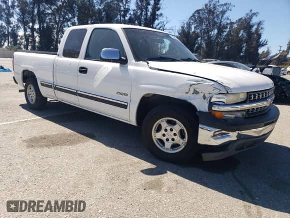 2001 Chevrolet Silverado 1500 LS with VIN 2GCEC19V611190085, listed as a Copart auction lot 72036335 with 165,772 mi miles and Salvage title. Bid and sale history available at DreamBid. Image 4.