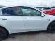 2023 Tesla Model Y Long Range с VIN 7SAYGDEE2PA032311, выставлен на аукционе IAAI как лот 42720695 с пробегом 20 640 миль миль и . История ставок и продаж доступна на DreamBid. Изображение 13.