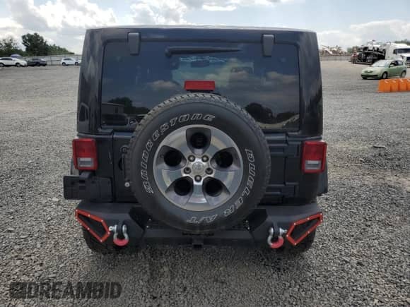 2016 Jeep Wrangler Sahara with VIN 1C4AJWBG4GL140284, listed as a Copart auction lot 64073535 with 101,677 mi miles and Salvage title. Bid and sale history available at DreamBid. Image 6.