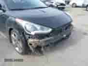 2013 Hyundai Veloster Turbo с VIN KMHTC6AE3DU158036, выставлен на аукционе IAAI как лот 43401490 с пробегом 142 089 миль миль и . История ставок и продаж доступна на DreamBid. Изображение 14.