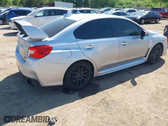 2017 Subaru WRX STI with VIN JF1VA2M6XH9812710, listed as a IAAI auction lot 42230446 with 85,125 mi miles and . Bid and sale history available at DreamBid. Image 4.